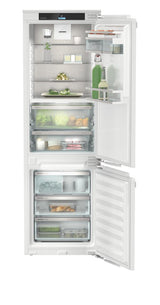 Combined refrigerator-freezer with BioFresh and NoFrost for integrated use