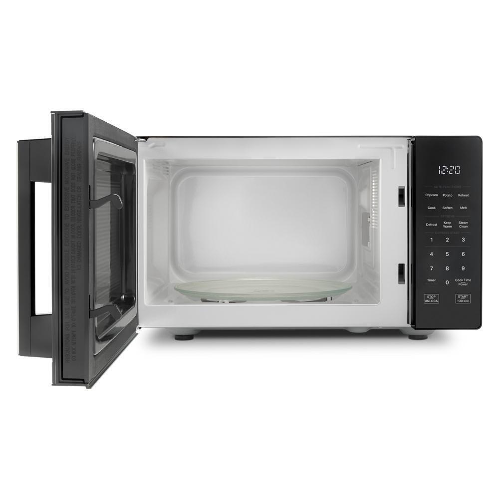 0.9 cu. ft. Black Countertop Microwave With Steam Clean - 900 watt