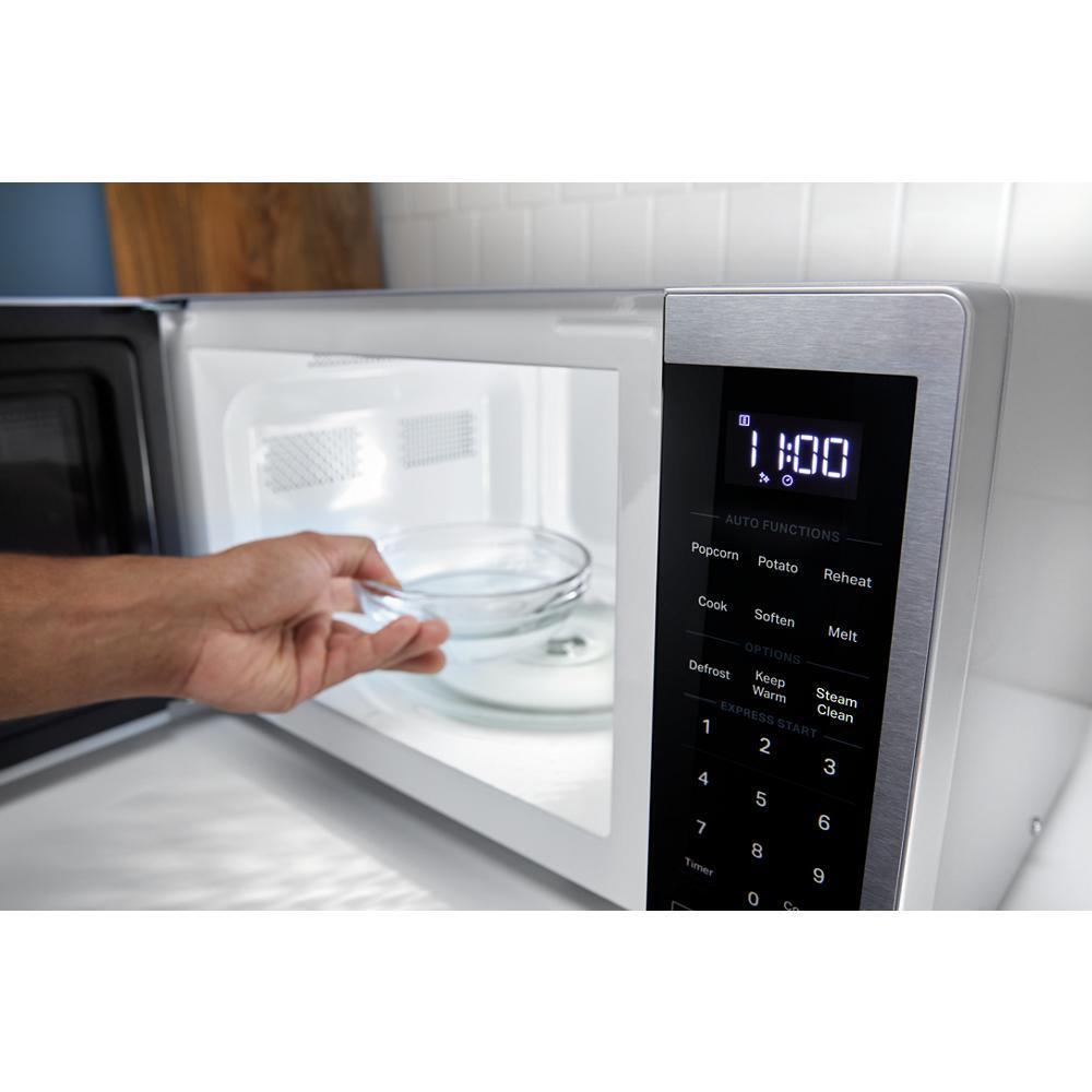 0.7 cu. ft. White Countertop Microwave With Steam Clean - 700 watt